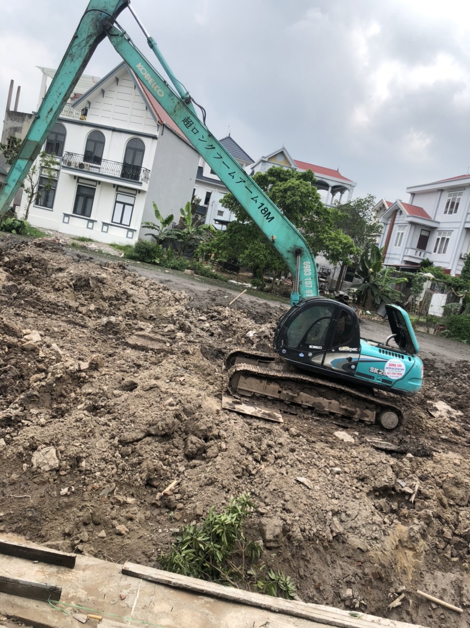 Máy Xúc Cần Dài